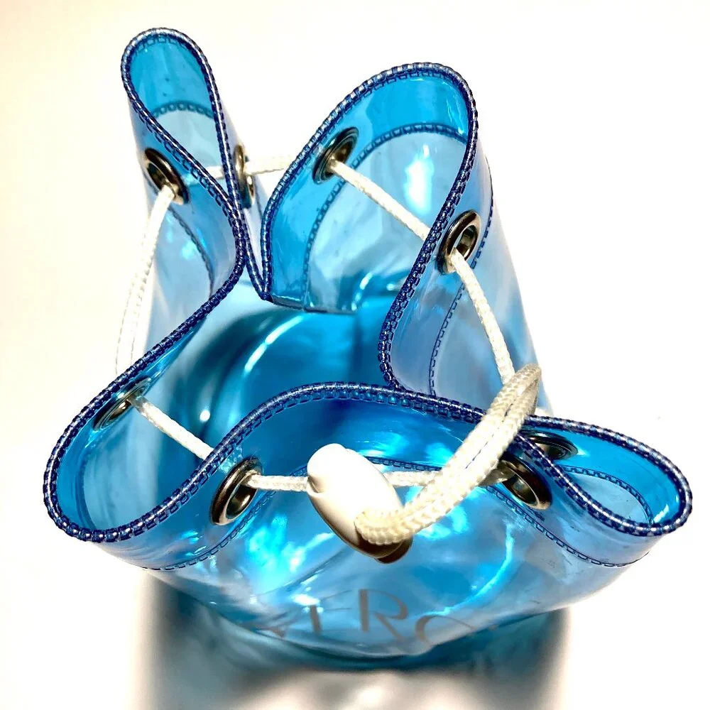CoverGirl Plastic Duffle Bag with rope closure